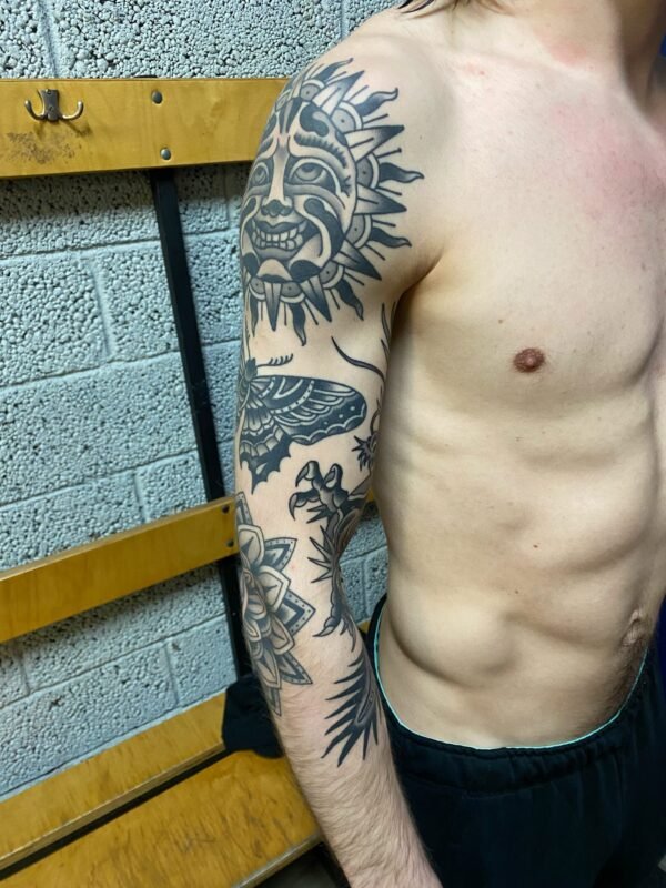 Tattoo by Jānis Burmeisters, Rīgas Tinte